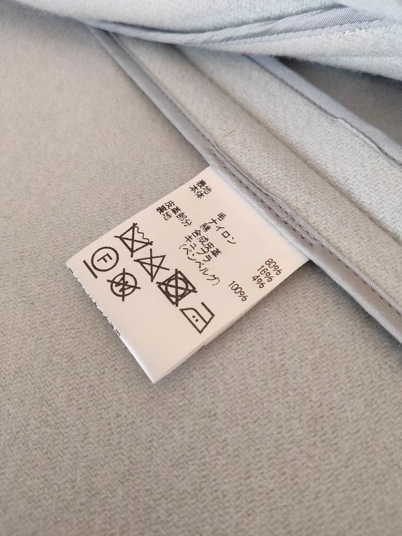 アクアスキュータム　ダッフルコート　水色