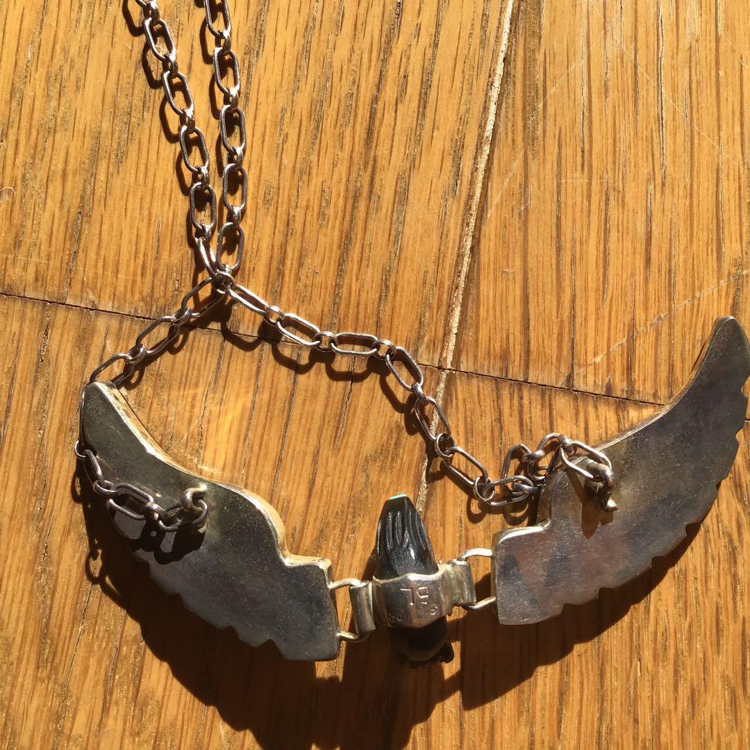 ターコイズ色の翼デザインネックレス