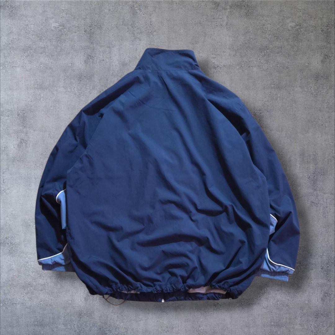 90s Reebokリーボックナイロンジャケット 刺繍ロゴ万国旗タグビッグサイズ