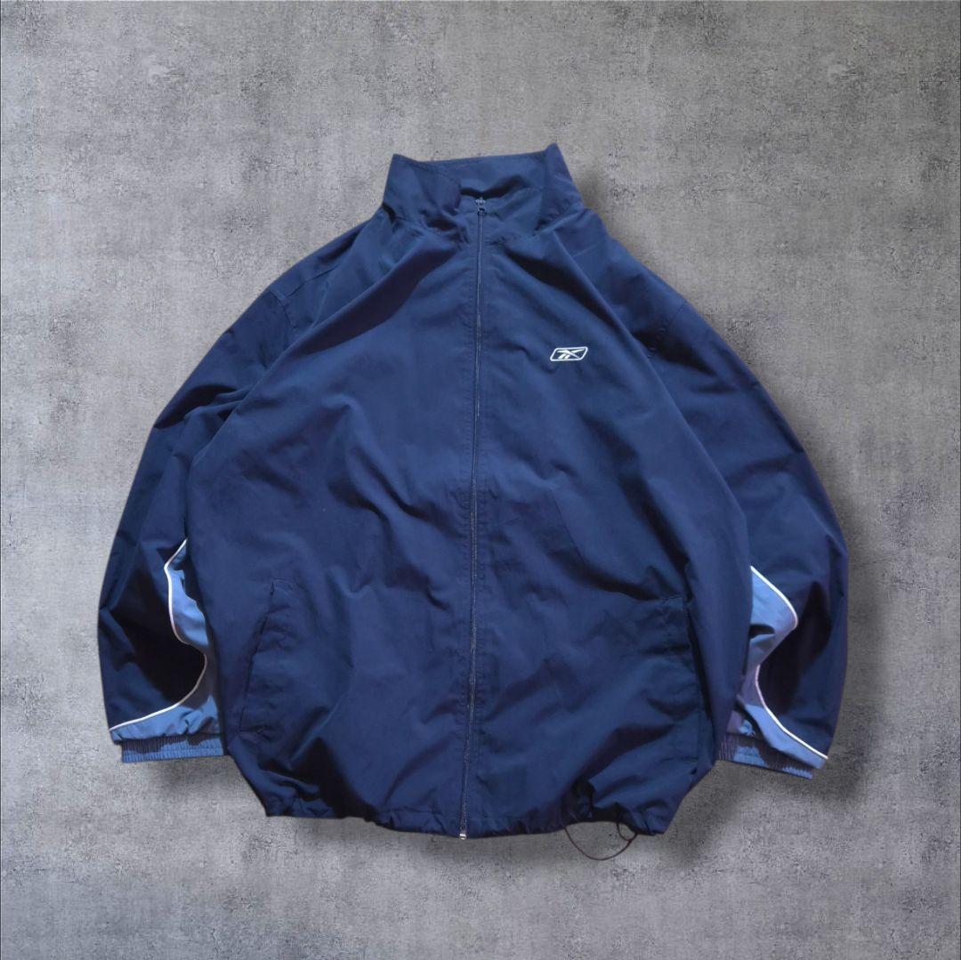 90s Reebokリーボックナイロンジャケット 刺繍ロゴ万国旗タグビッグサイズ
