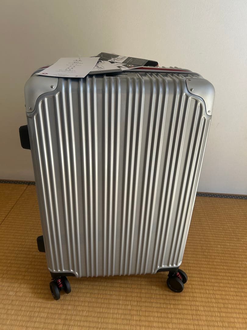 【新品】トランスコンチネンツ スーツケース シルバー 61リットル