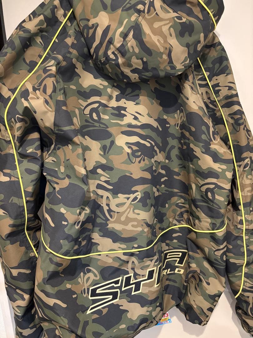 Syna World カモ柄ナイロンジャケット シナワールド