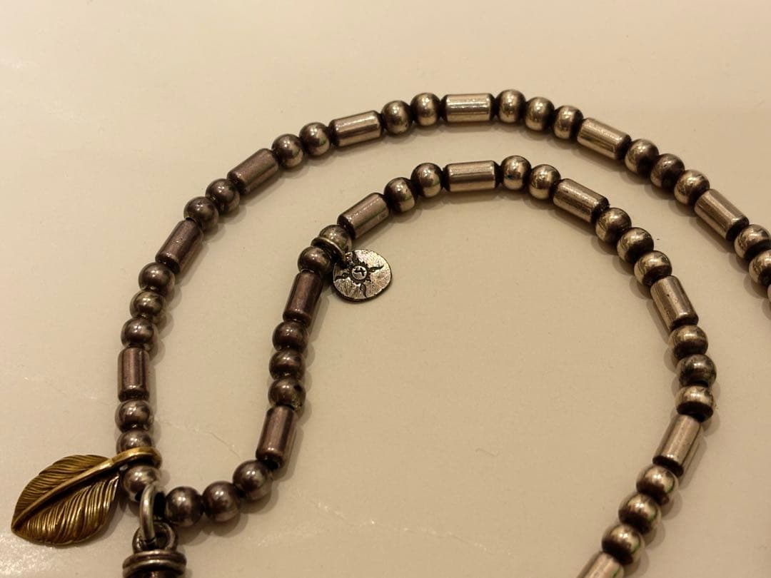 First arrows ファーストアローズ ターコイズ付き唐草クロスネックレス