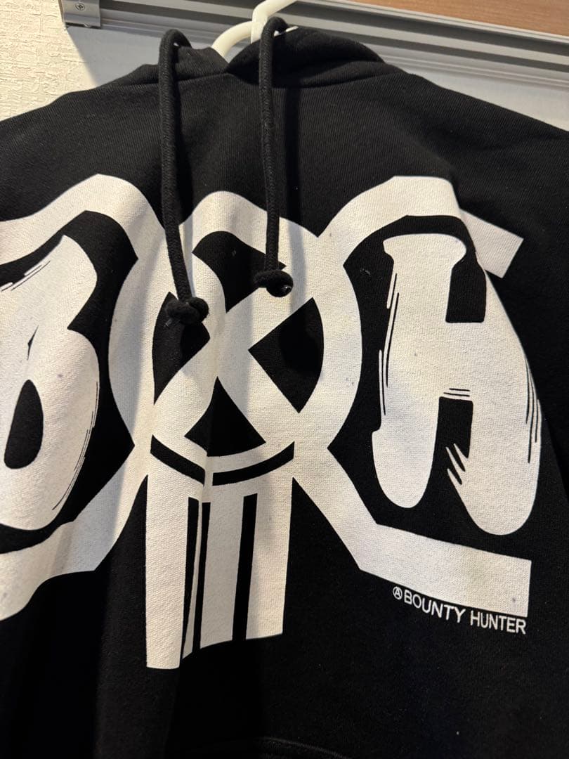 BOUNTYHUNTER SNEAKERWOLF パーカー