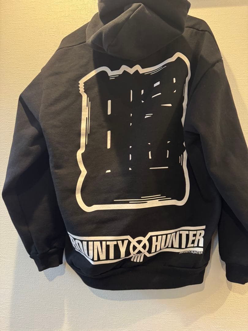 BOUNTYHUNTER SNEAKERWOLF パーカー