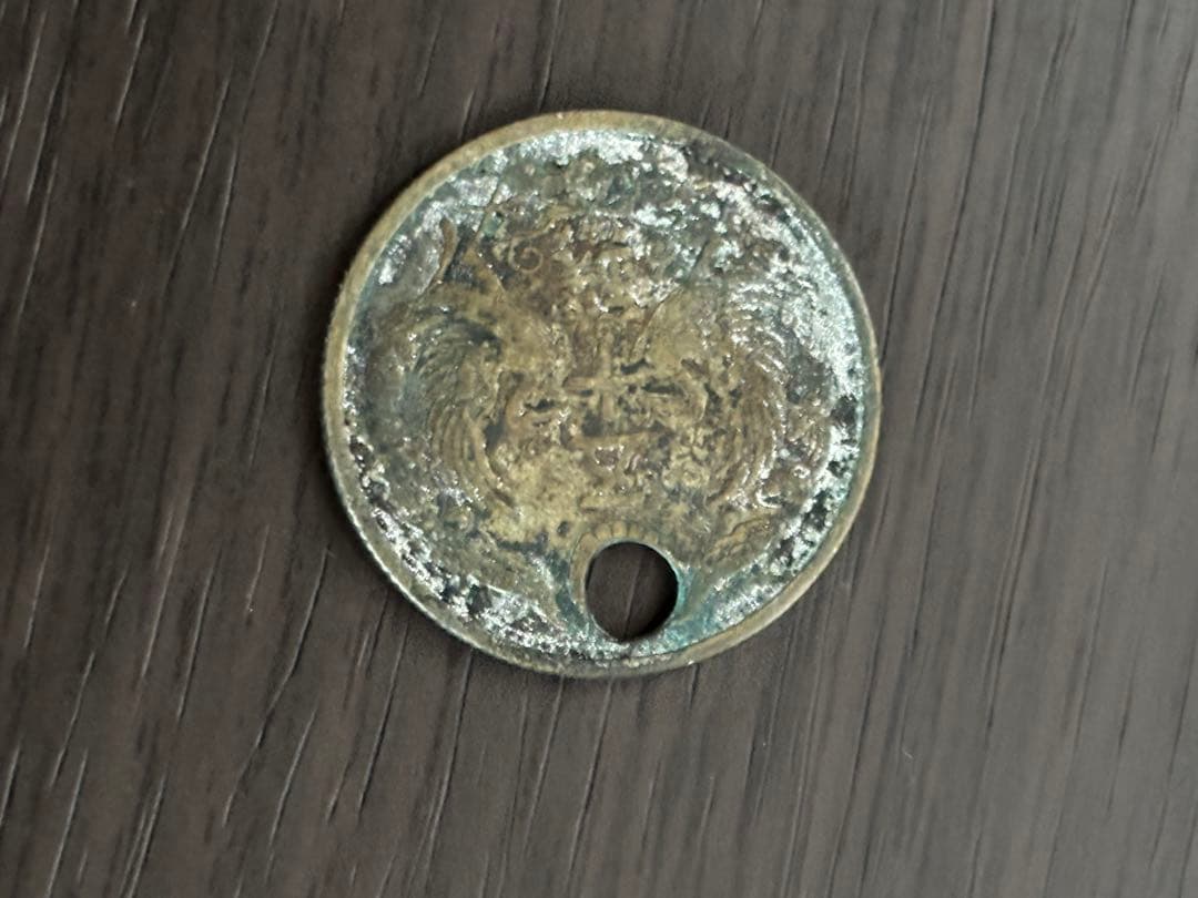 小型50銭銀貨50枚セット(1枚だけ穴あき)