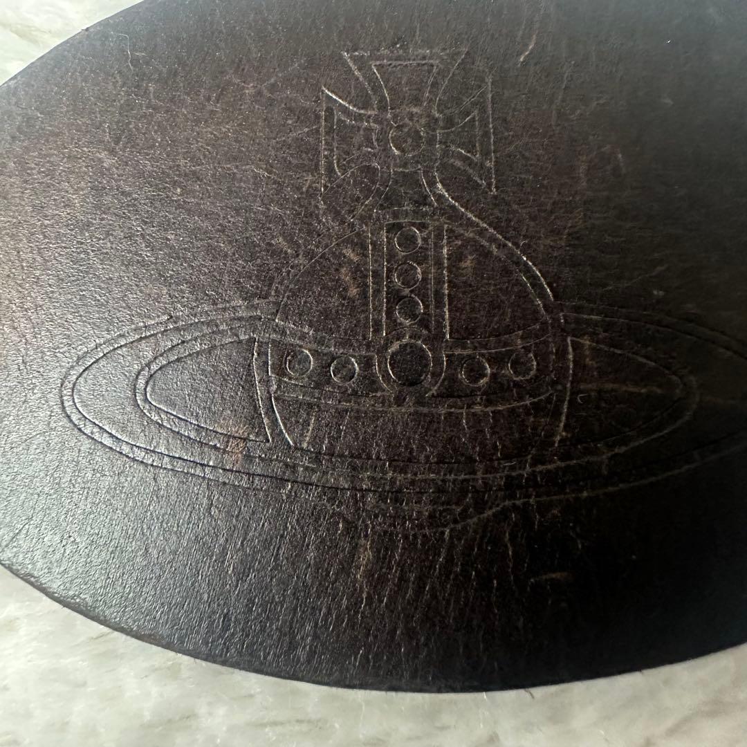 ヴィヴィアン レザーベルト フラワーデザイン オーブ型押印