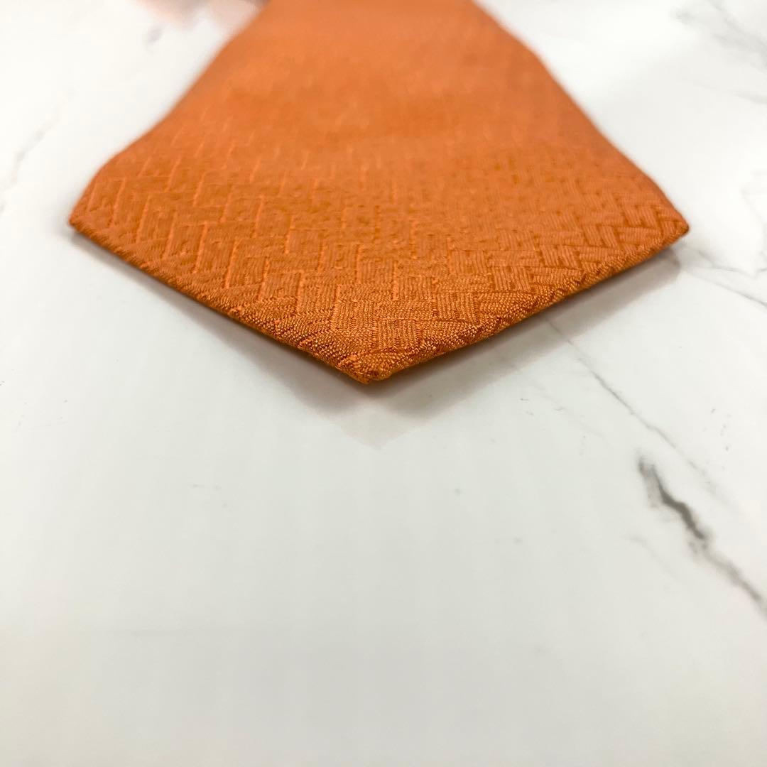 け。　極美品　エルメス　ネクタイ　ファソネ　H柄　H織　ソリッド　オレンジ