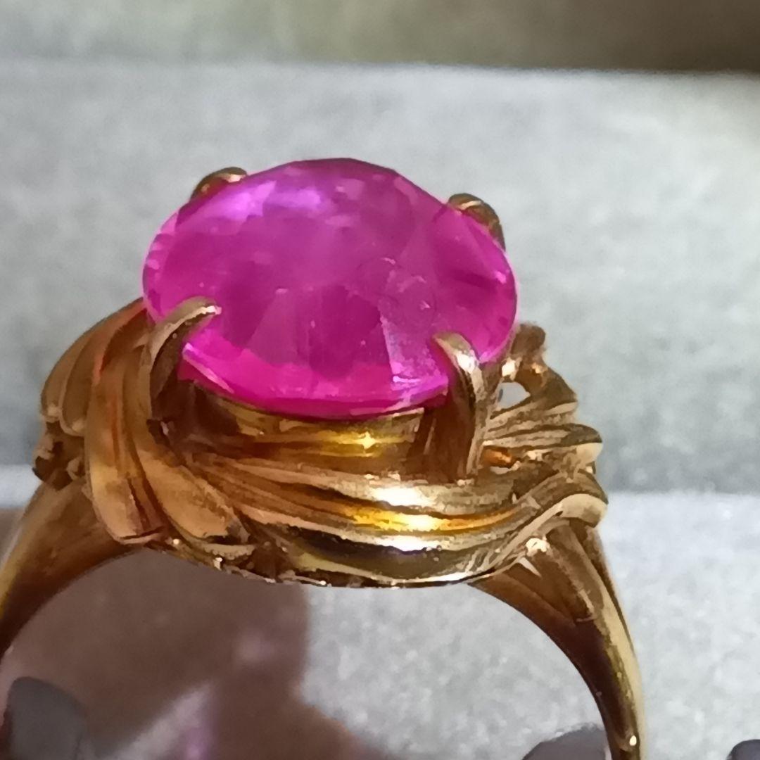 ピンク色おたからや聞くルビーかストーンリングK１８内径約１６mm重量合計４.５g