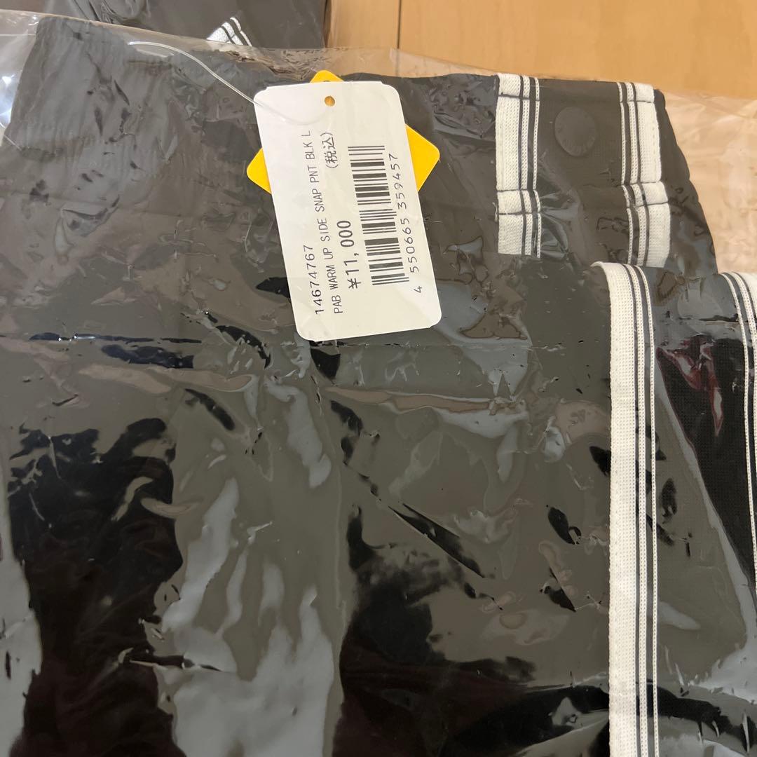 セットアップ　ニューエラ　ウォームアップ バーチカルロゴ ブラック