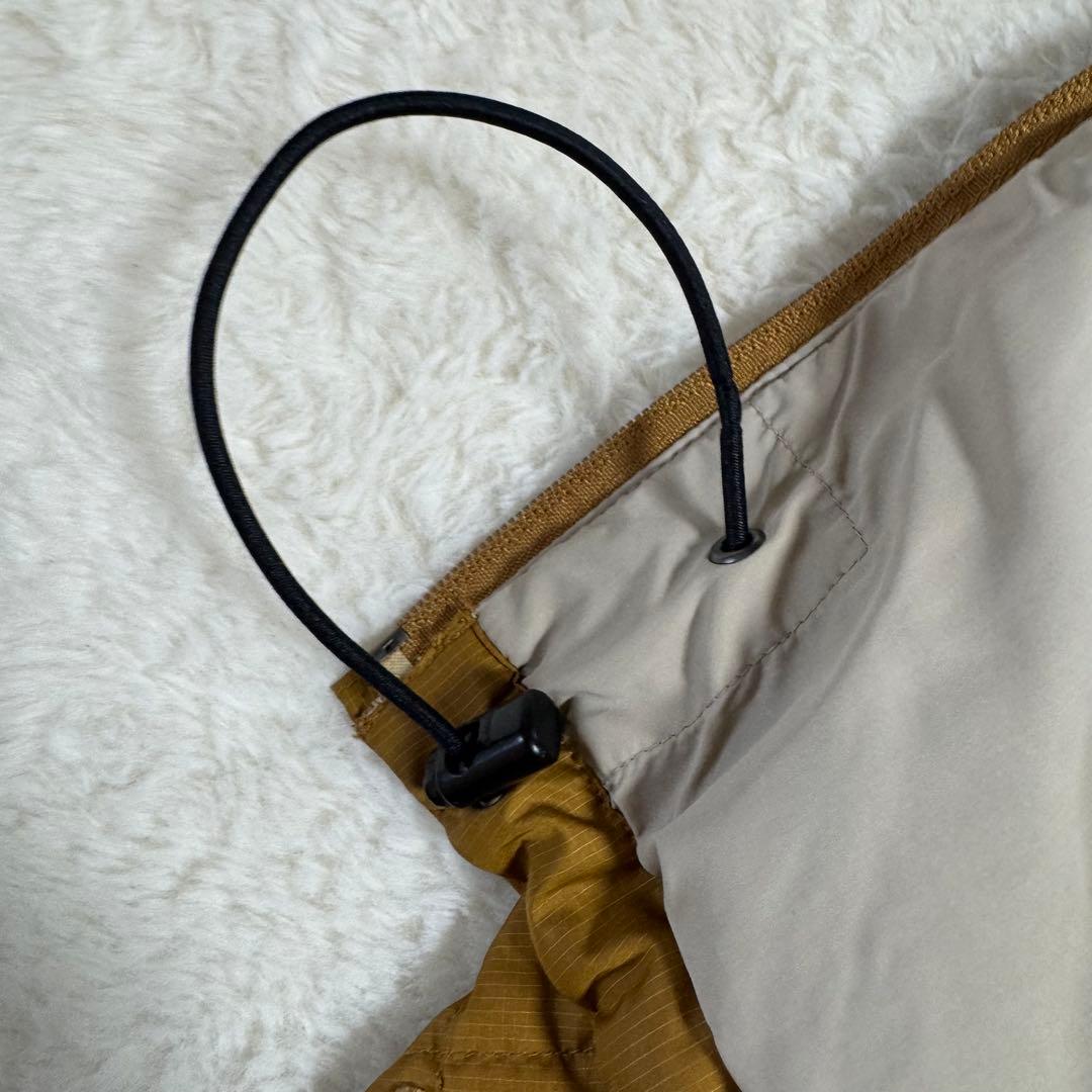 モンベル725FPライトネージュダウンジャケットLサイズ 黄ドローコード短丈