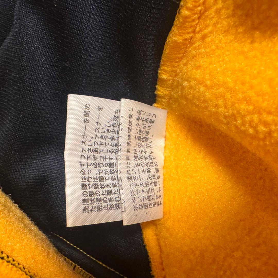 THE NORTH FACEフリース ジャンプスーツ（イエロー×ブラック）