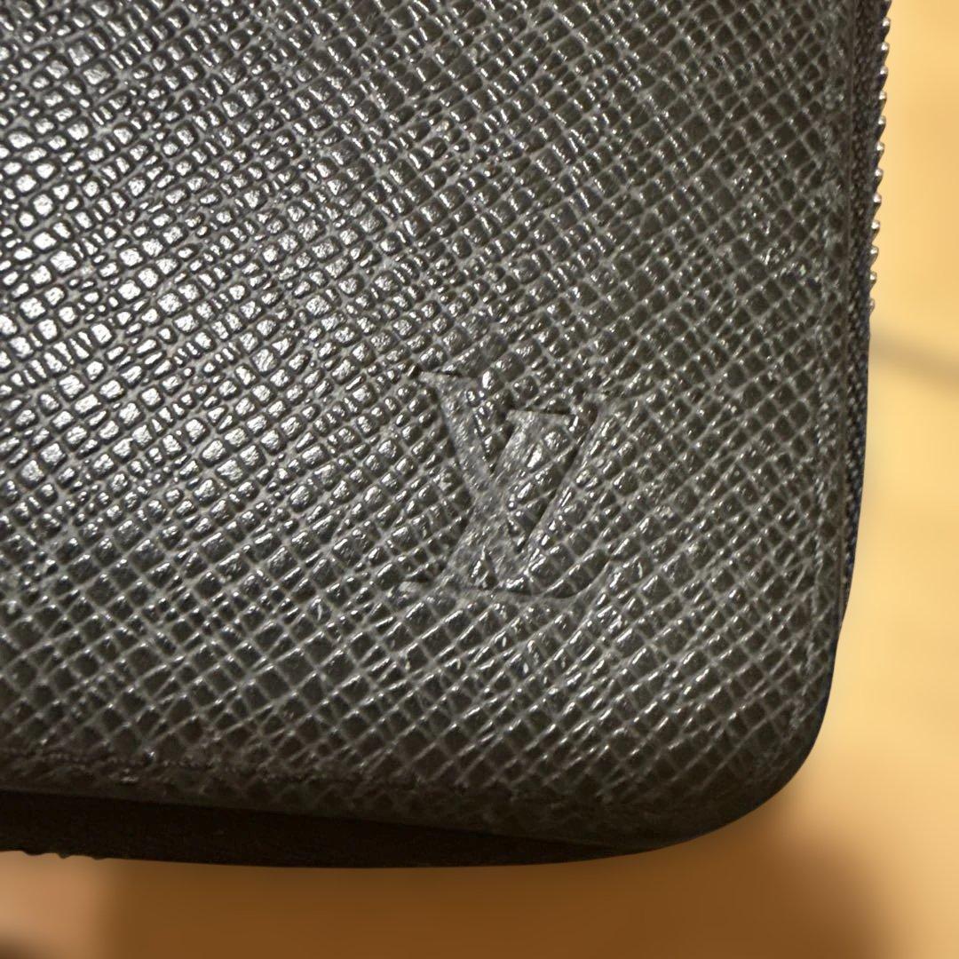 ルイヴィトン　タイガ　ジッピーウォレット・ヴェルティカル　長財布