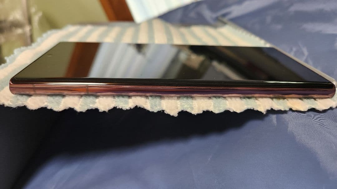 ‼️値引き中 中古良品‼️GalaxyS22Ultra au バーガンディ