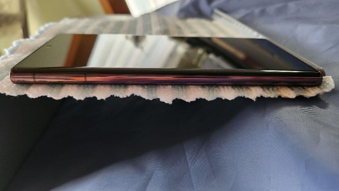 ‼️値引き中 中古良品‼️GalaxyS22Ultra au バーガンディ