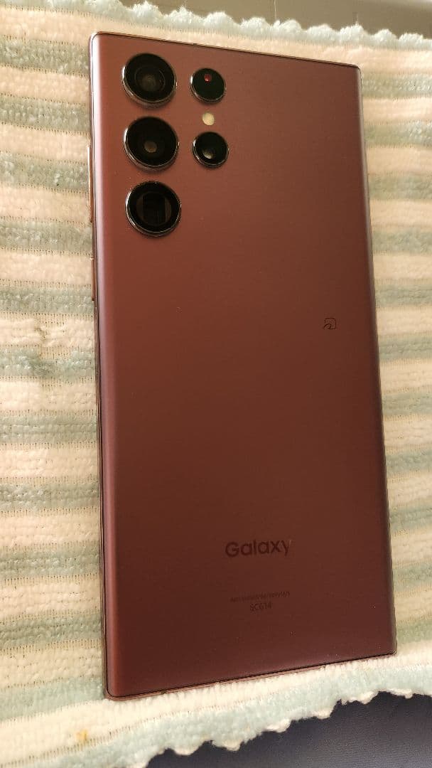 ‼️値引き中 中古良品‼️GalaxyS22Ultra au バーガンディ