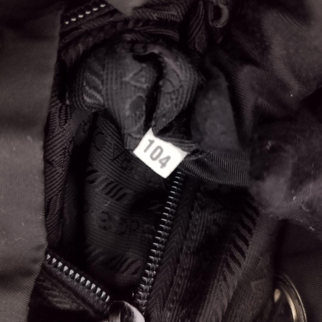 美品☆　プラダ　リュック　ベルト　フラップ　三角ロゴプレート　レザープレート