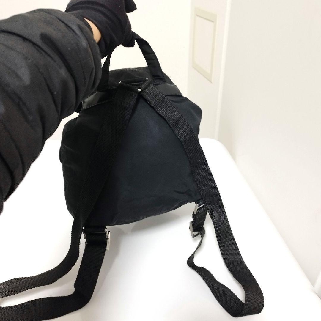 美品☆　プラダ　リュック　ベルト　フラップ　三角ロゴプレート　レザープレート