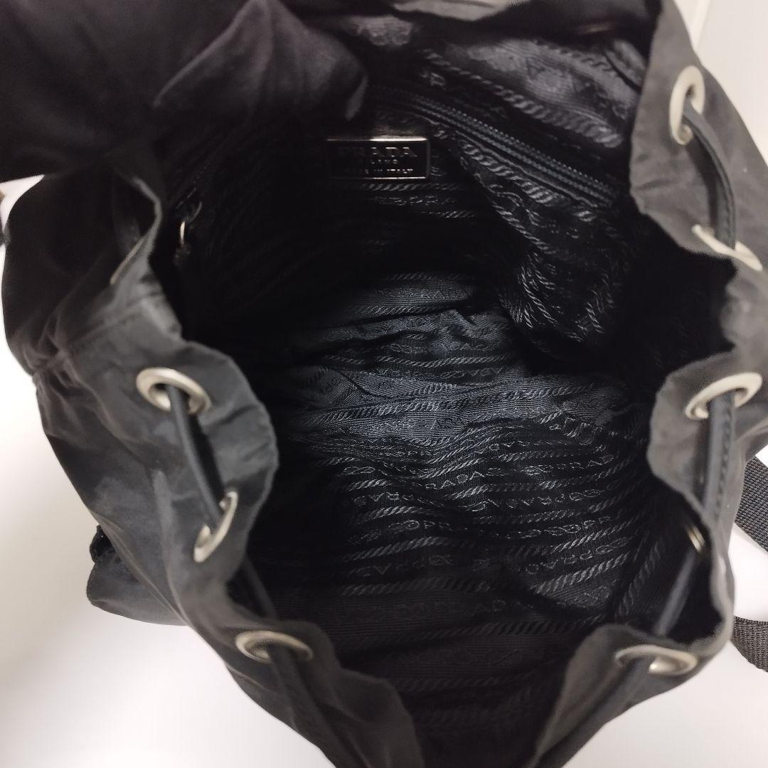 美品☆　プラダ　リュック　ベルト　フラップ　三角ロゴプレート　レザープレート