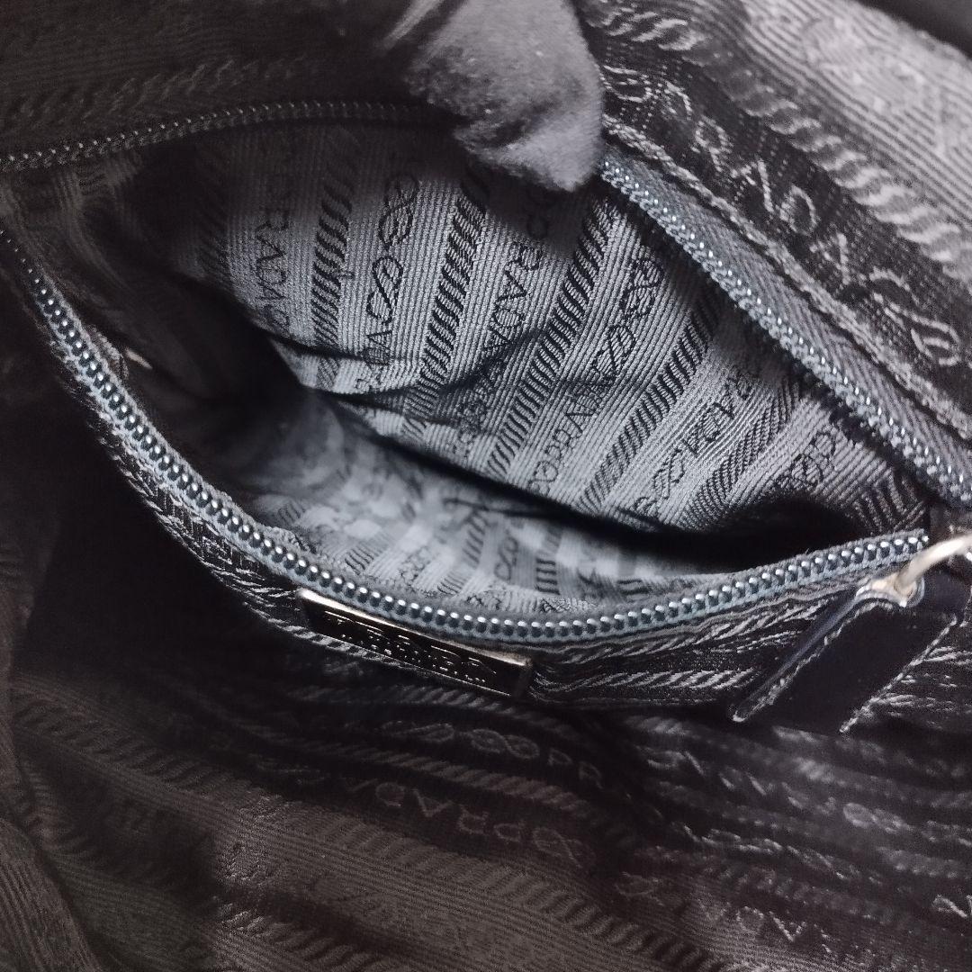 美品☆　プラダ　リュック　ベルト　フラップ　三角ロゴプレート　レザープレート