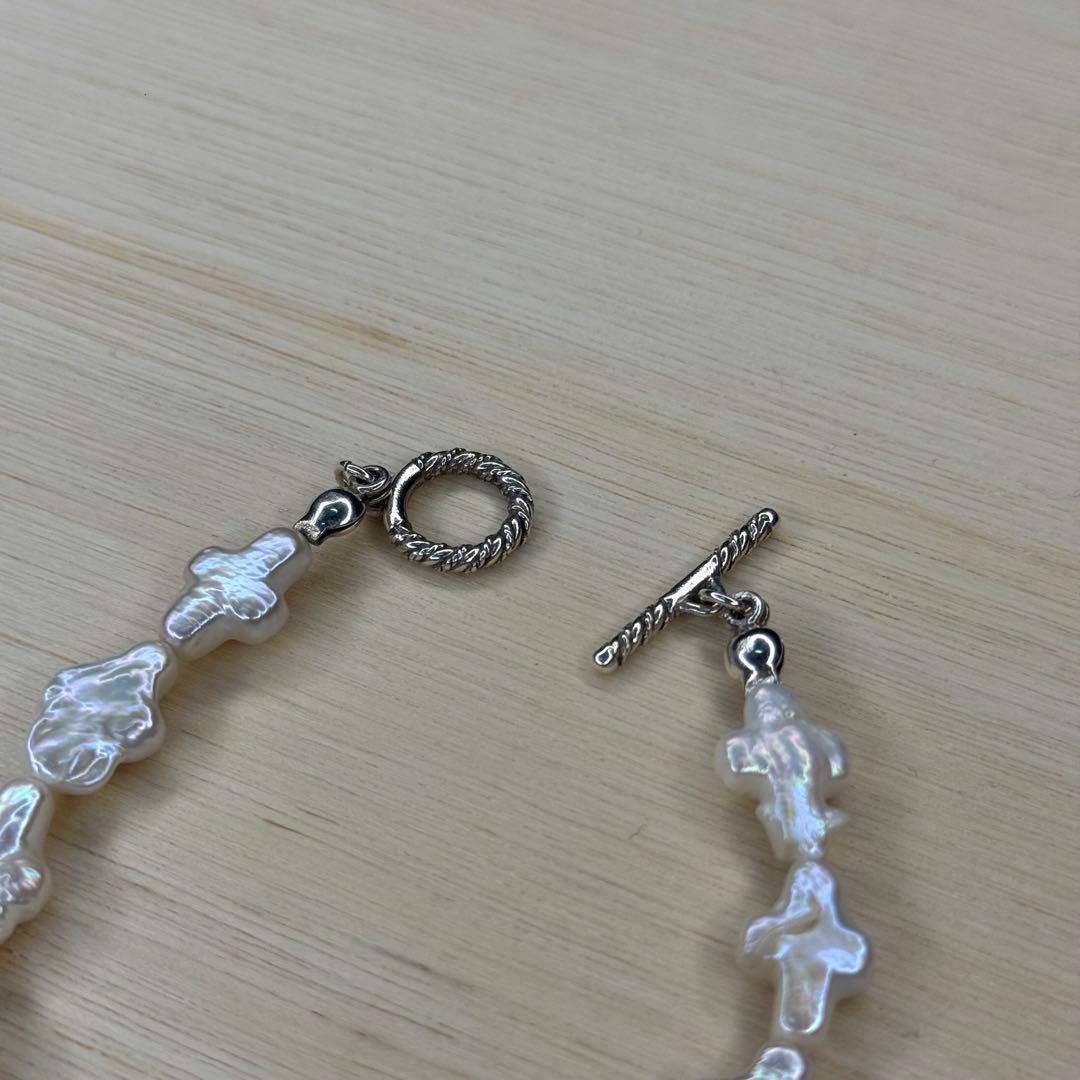 アクセサリー COOTIE Distortion Cross Pearl Bracelet