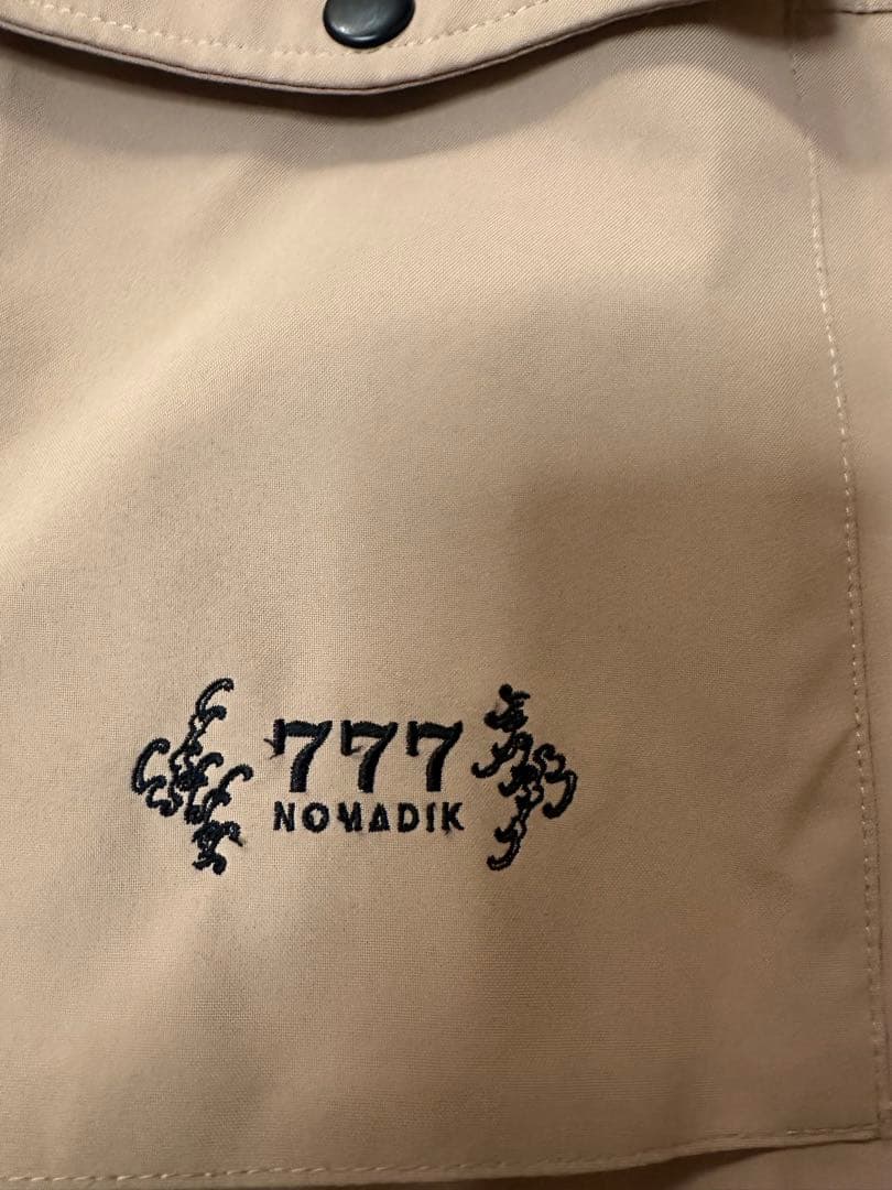 定価より半額中！ノマディックNOMADIK 777 JACKETメンズLサイズ