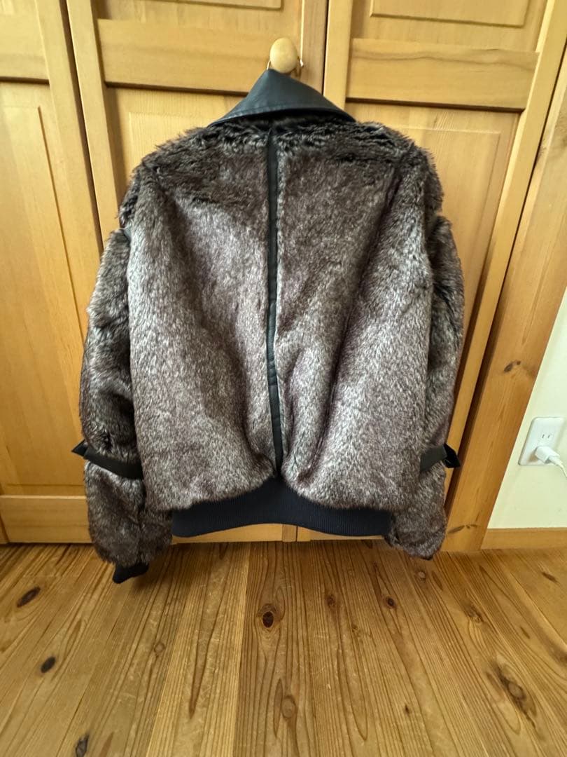 UNDERHUNK / スイッチデザインフェイクファーフライトジャケット