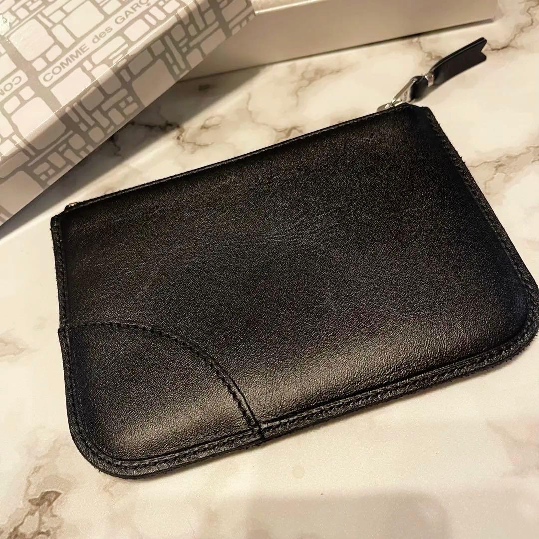 COMME des GARÇONS ケース　ポーチ　アイレット