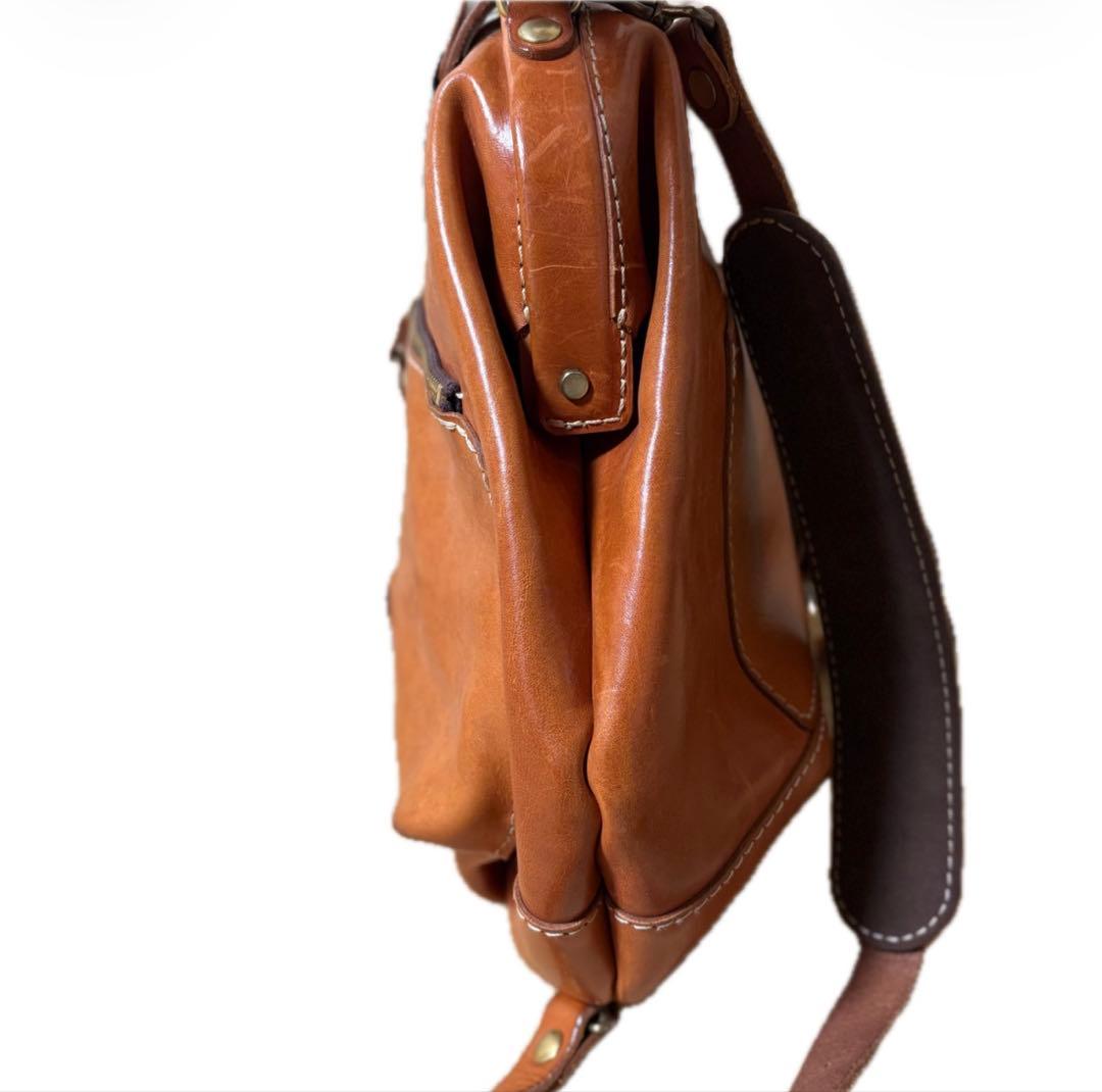 ヘルツ わんぱくリュック がま口 レザー バックパック ロック金具 鍵付き 茶