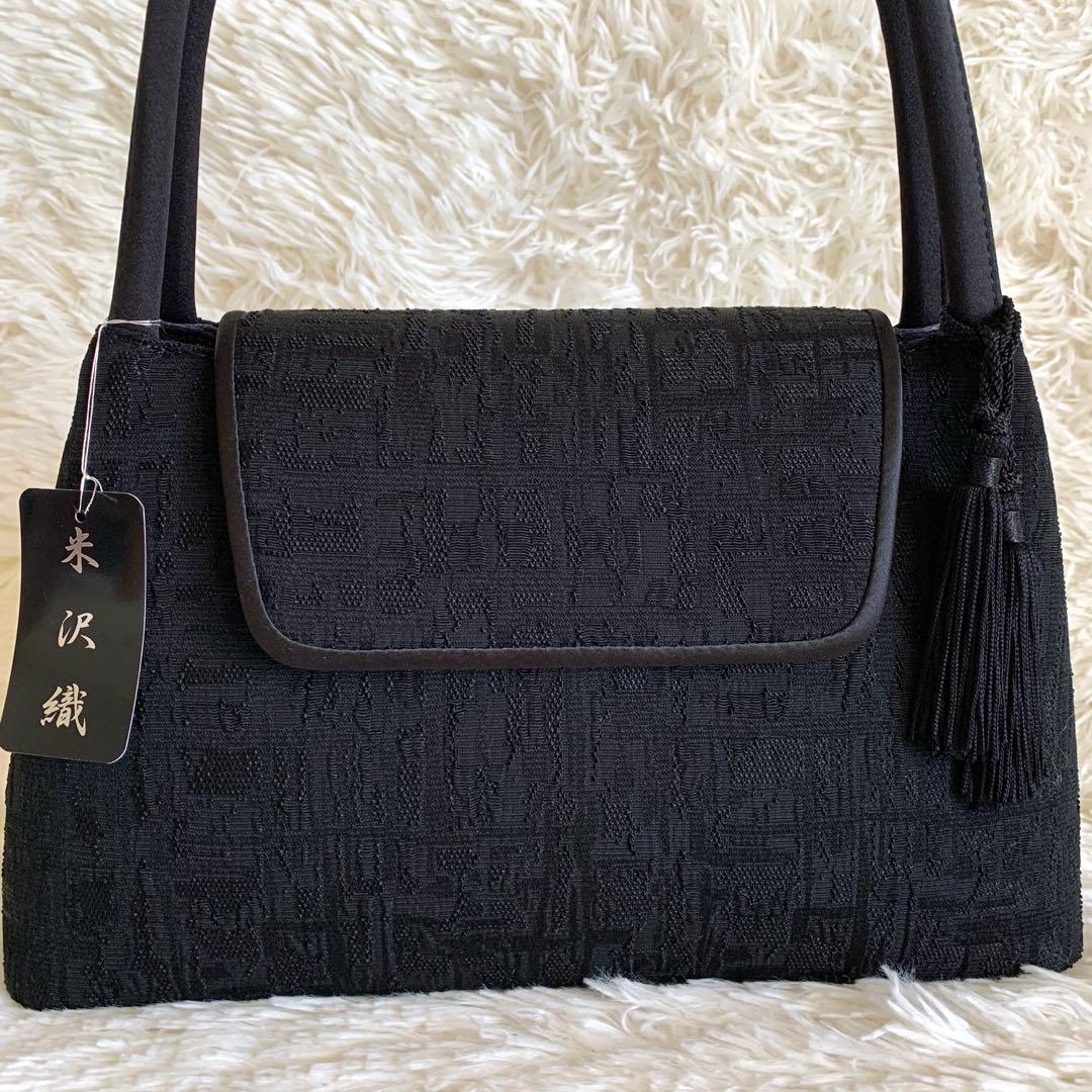 くみちゃん様　IWASA 岩佐　米沢織　フォーマルバッグ ブラック　タッセル付き