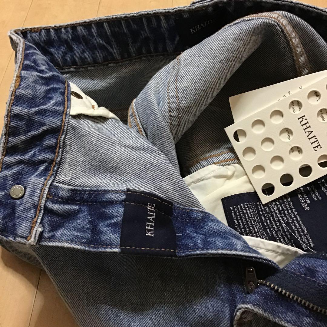 KHAITEブルーダメージデニムパンツ