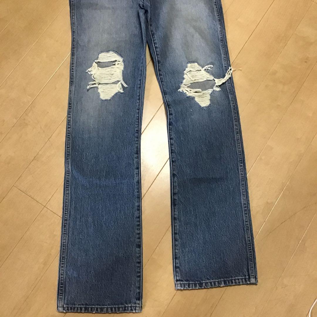 KHAITEブルーダメージデニムパンツ