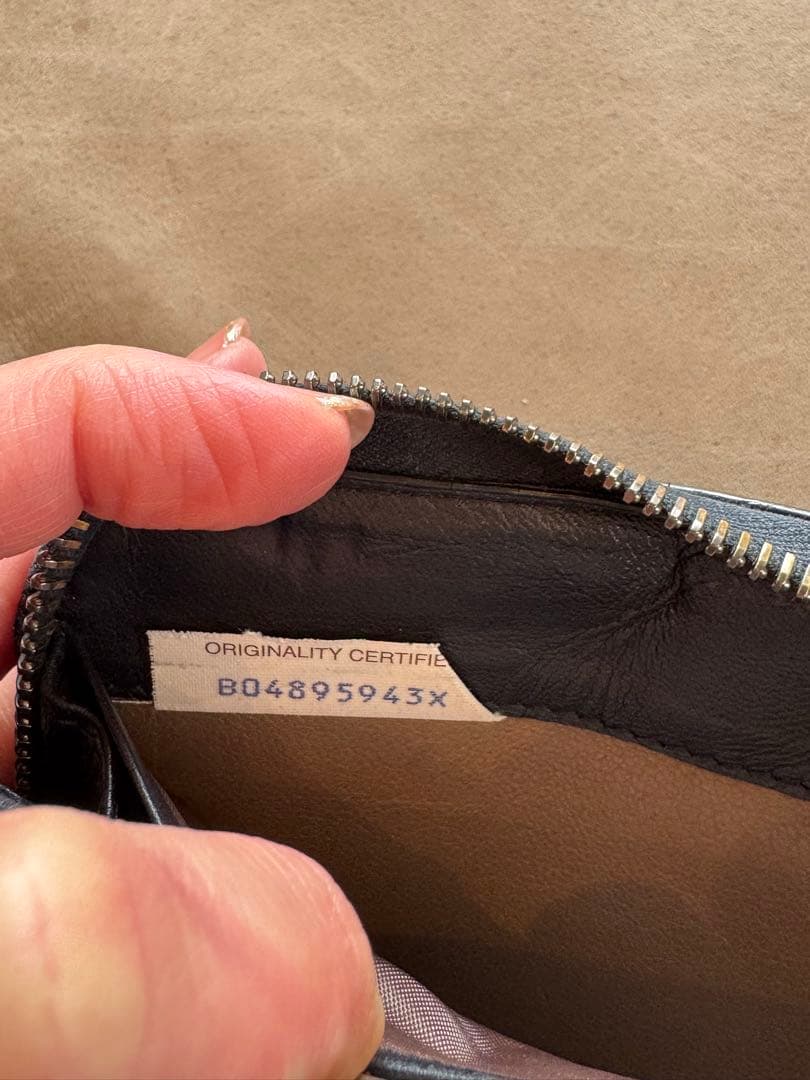 ボッテガヴェネタ　パイソンブラックレザー長財布 編み込みデザイン