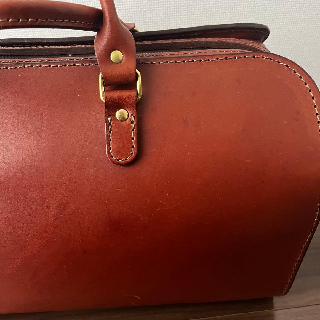 ヘルツ 二本手ファスナーボストンバッグ