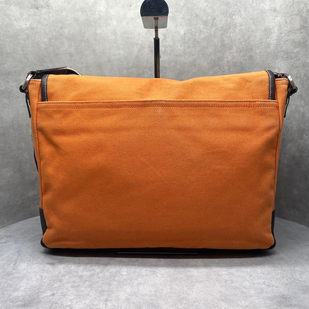 バッグ COACH Orange Canvas Leather Messenger