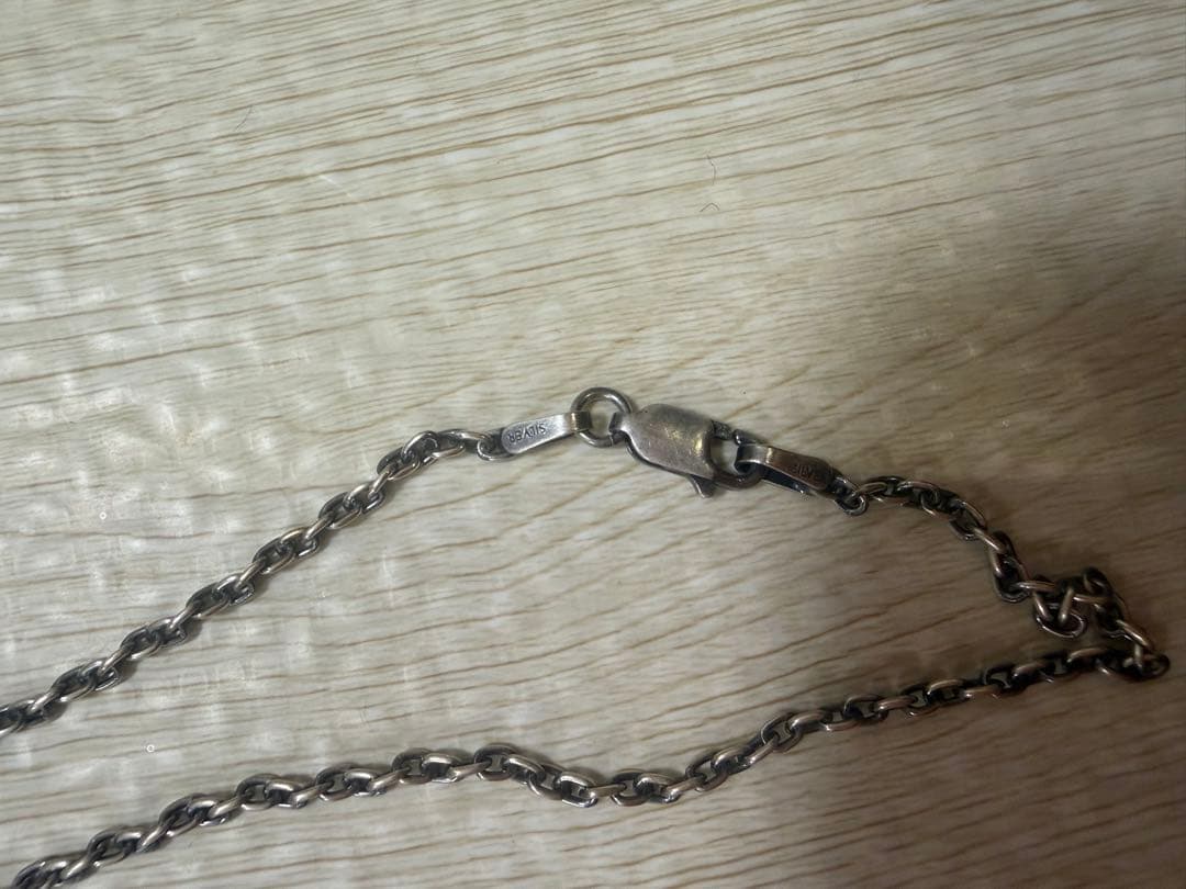 羽根モチーフ ネックレス 青い石付き