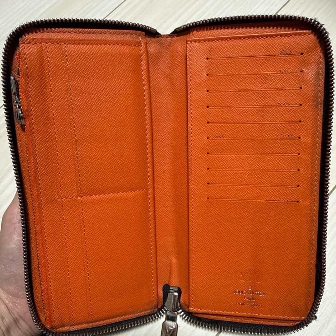 ルイ・ヴィトン モノグラム・タイガラマ ジッピーウォレット オレンジ色
