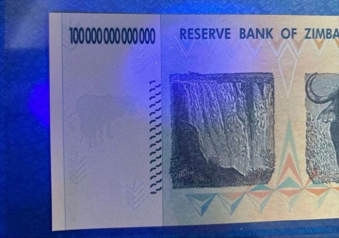 【保証書付き】ジンバブエ 100兆ドル札 , UVチェック済み 連番2枚
