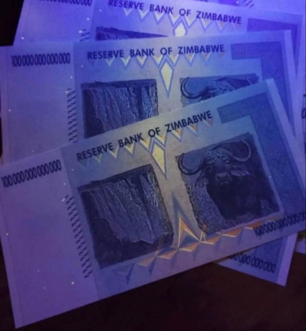 【保証書付き】ジンバブエ 100兆ドル札 , UVチェック済み 連番2枚