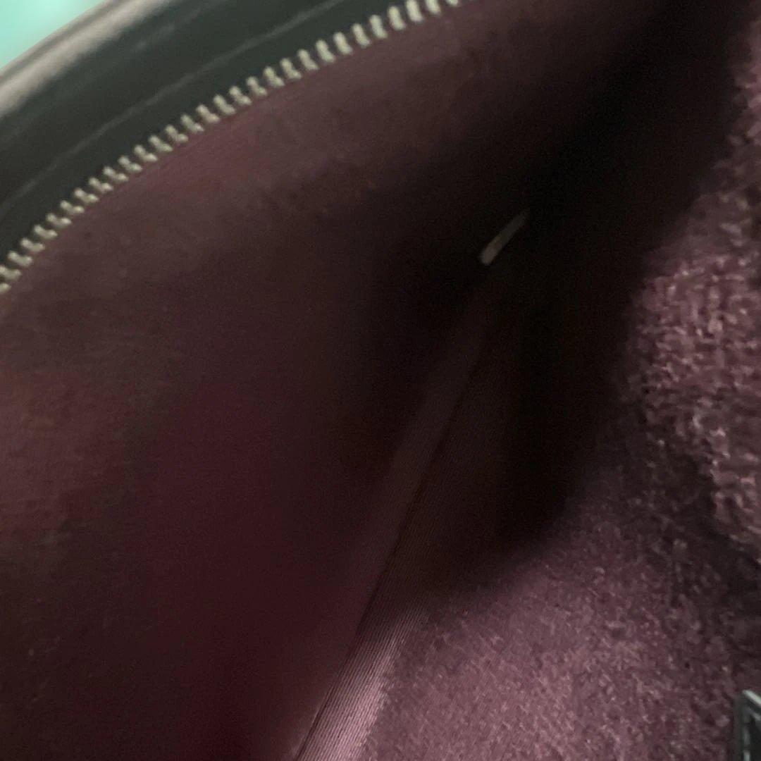 CHANEL カメリア革ポーチ