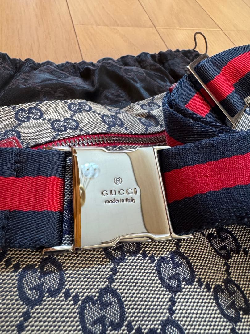 Gucci（グッチ）GGキャンバス × レザー ダブルポケット ベルトバッグ