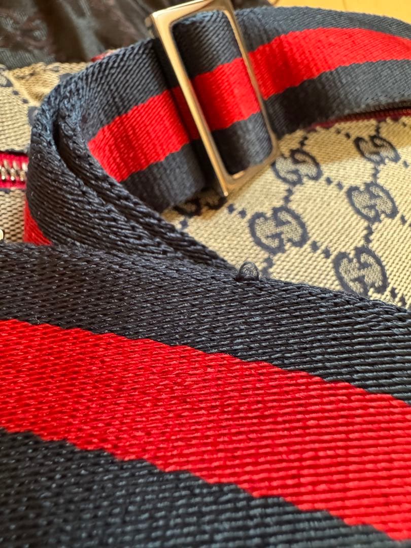 Gucci（グッチ）GGキャンバス × レザー ダブルポケット ベルトバッグ