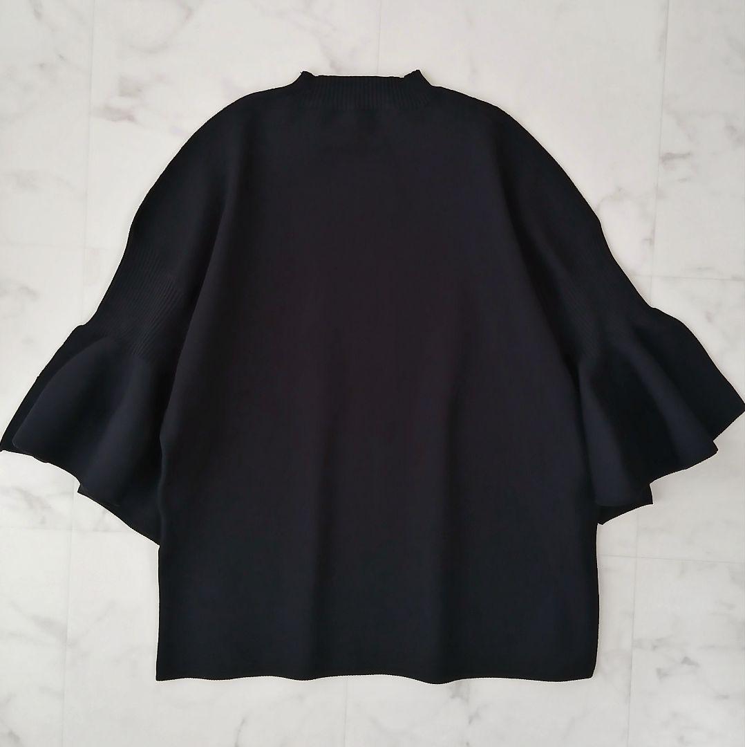 美品 アドーア 近年 フォルムドストレッチニット 七分袖 フリル ブラック 38