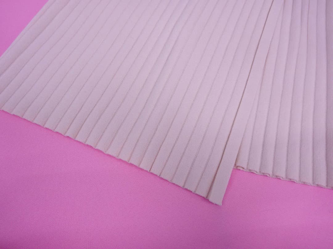 リビアナコンティリブ編みニットロングスカートウエストチラ見え　アシンメトリー