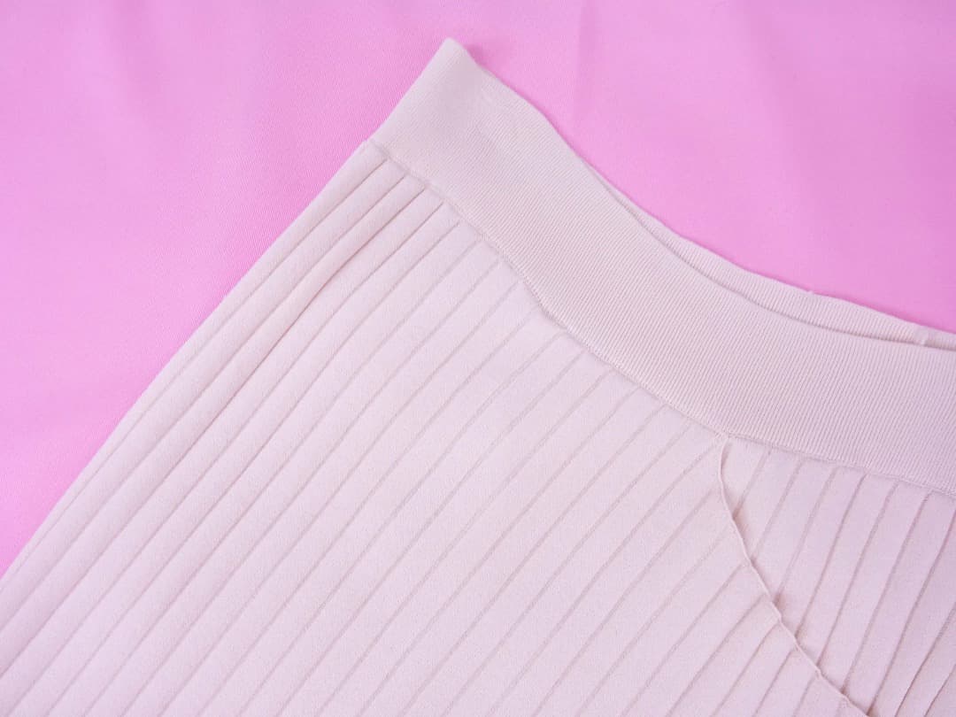 リビアナコンティリブ編みニットロングスカートウエストチラ見え　アシンメトリー