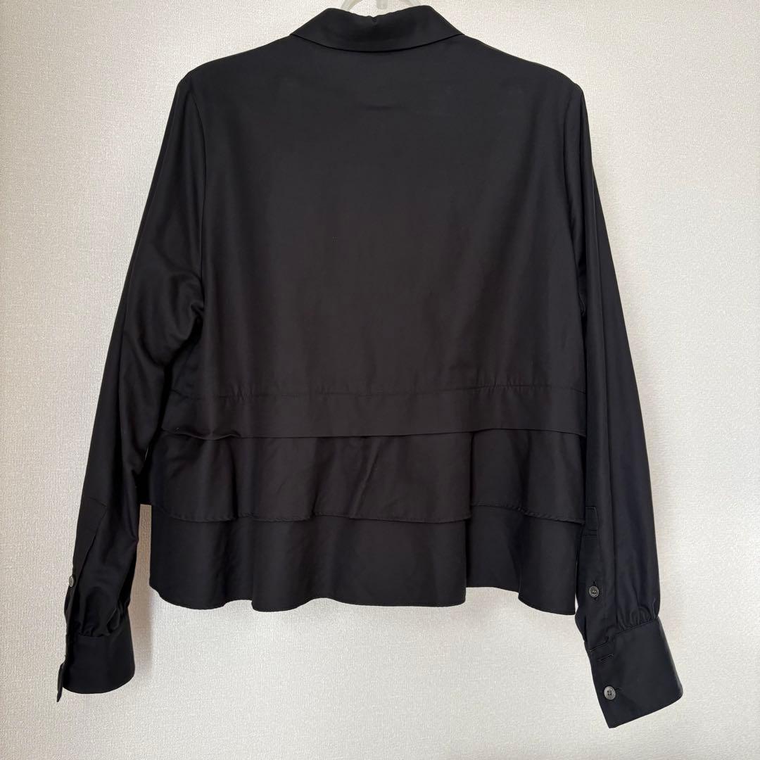 CABaNタイプライターダブルクロス アシンメトリックフリルロングスリーブシャツ