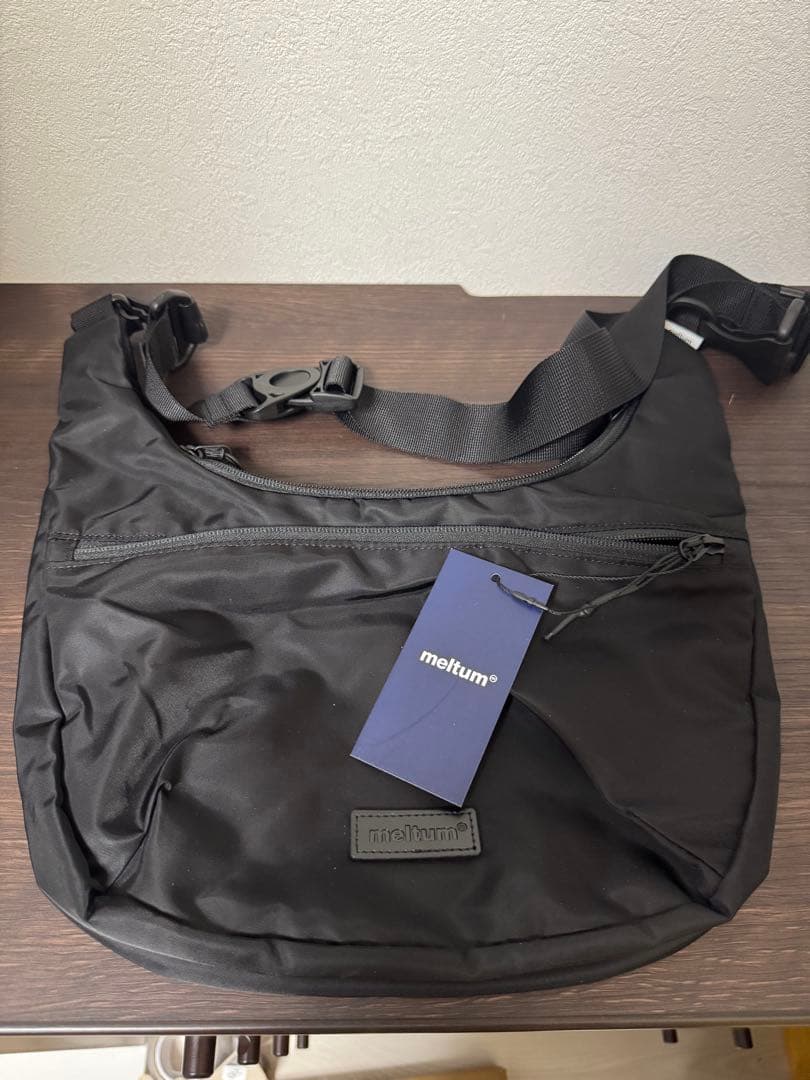 バッグ meltum NYLON CROSSBODY BAG