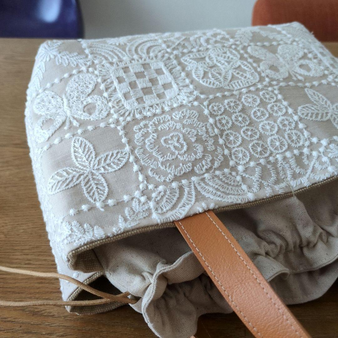 【1560】あおりポケットの巾着バッグ＊ミナペルホネン