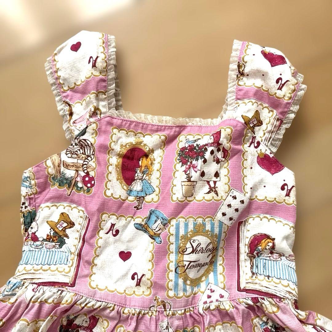 美品　シャーリーテンプル　不思議の国のアリス 絵本プリントワンピースピンク140