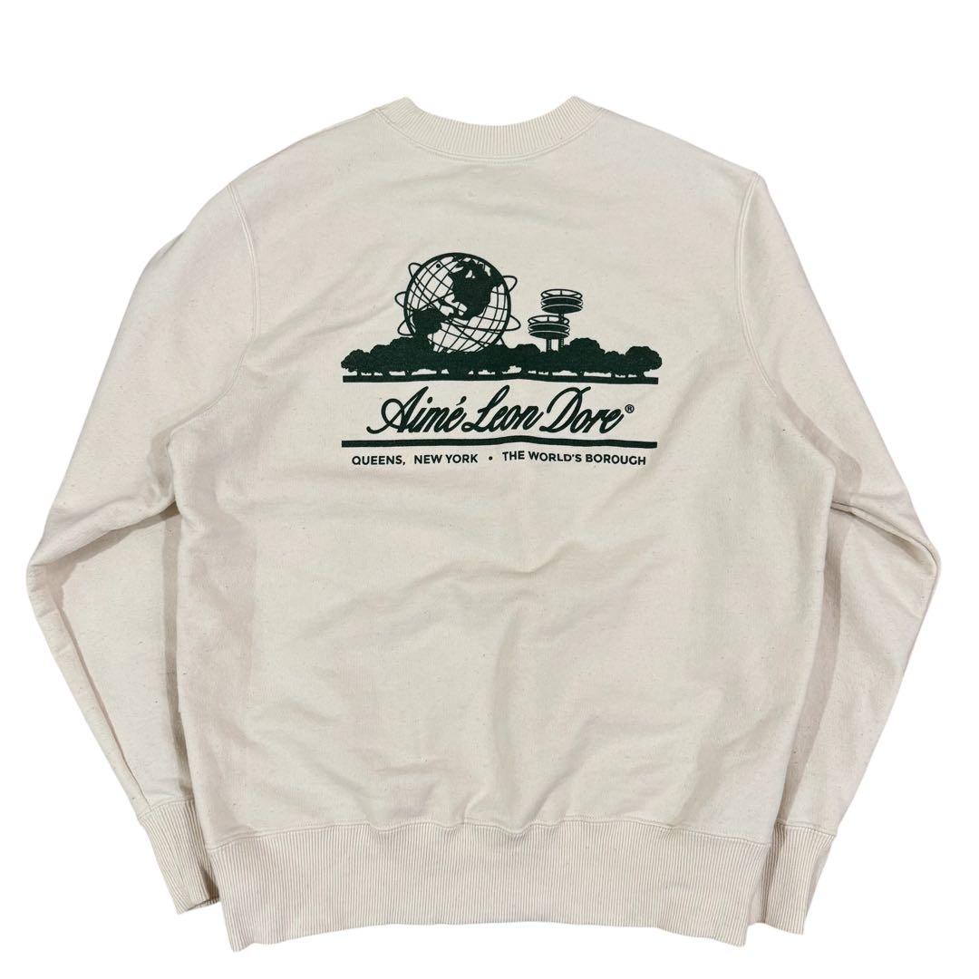 エメレオンドレ Unisphere Crewneck Sweatshirt